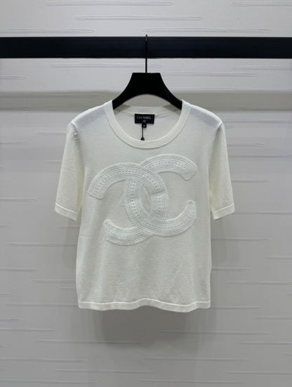 25  Double logo knitted short sleeved shirt