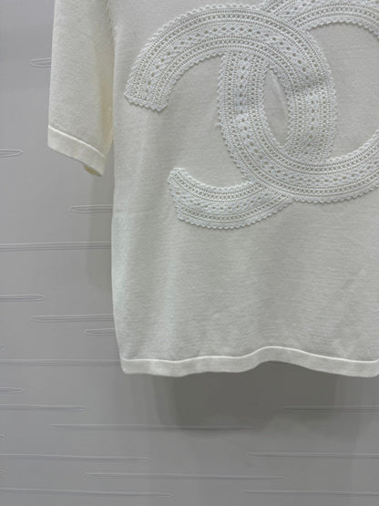 25  Double logo knitted short sleeved shirt