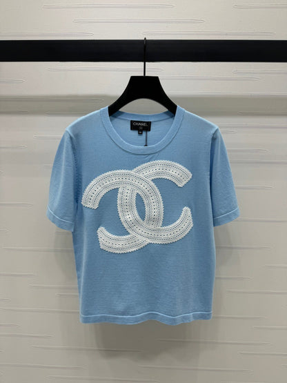 25  Double logo knitted short sleeved shirt