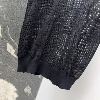 25  Jacquard hollow knitted top