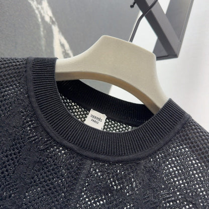 25  Jacquard hollow knitted top