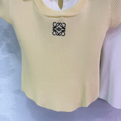 25  Short sleeved fake two-piece knitted top）