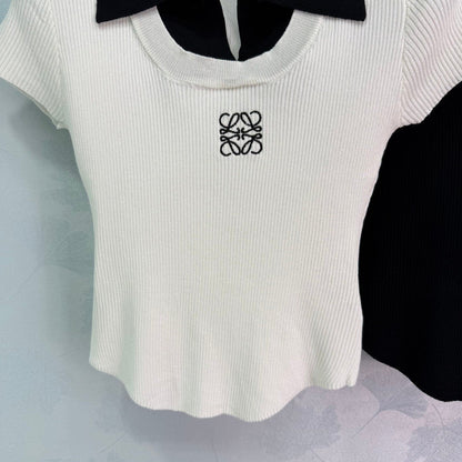 25  Short sleeved fake two-piece knitted top）