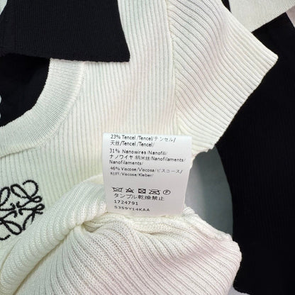 25  Short sleeved fake two-piece knitted top）