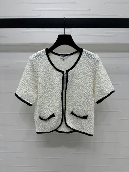 25  Particle velvet knitted short sleeved cardigan