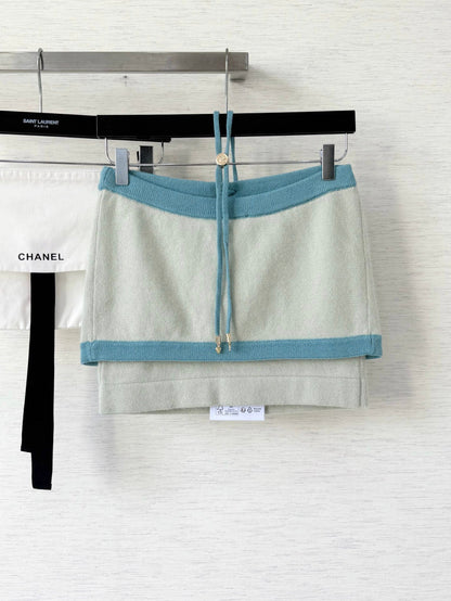 Pure wool, custom-colored and dyed, contrast-colored stitching, and camisole