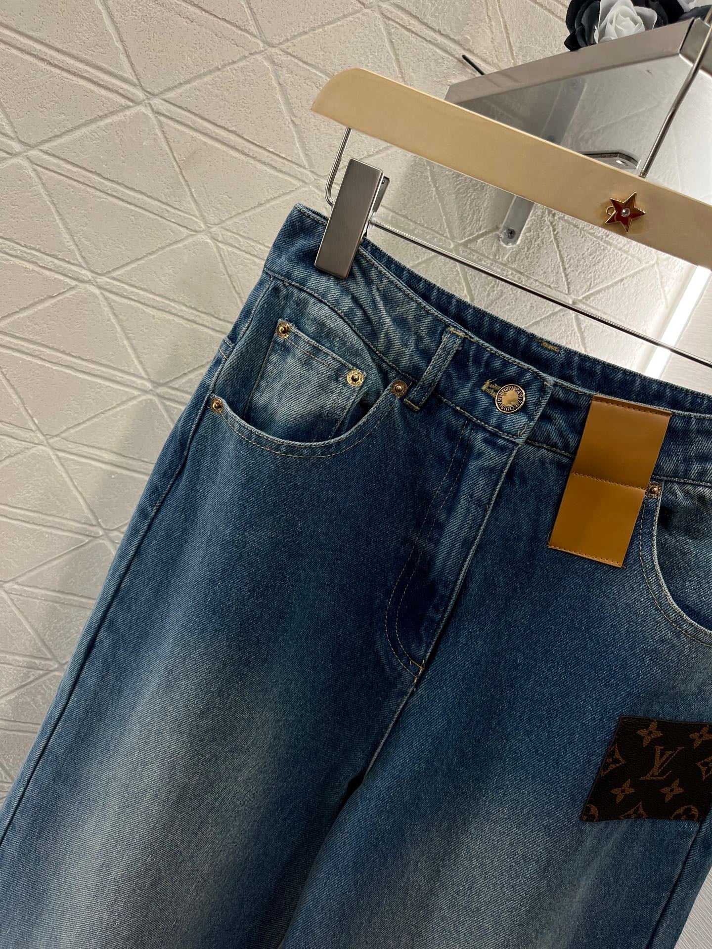 L 25 Small logo wide-leg jeans