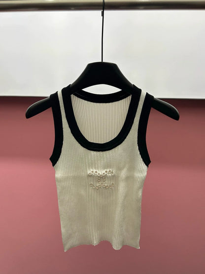 25  Cutout Embroidered Knit Vest