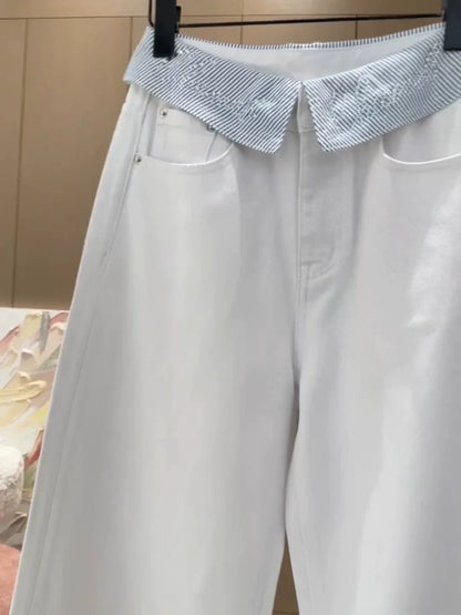 25 Cuffed rhinestone lettered denim straight-leg pants
