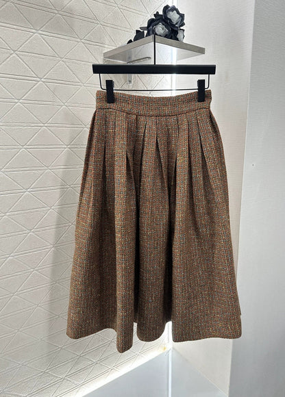 C 25 new styles featuring a lapel dress with beaded hem and skirt set.
