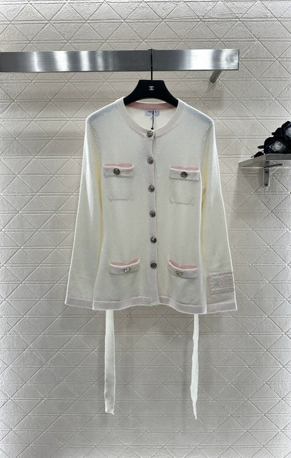 C New 25-item bag button and belted knitted cardigan.