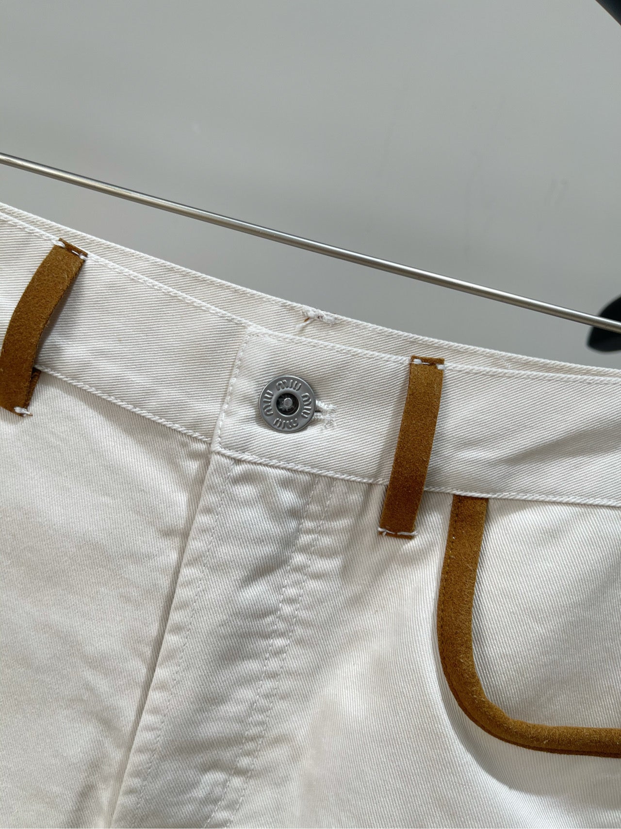 M 25 white suede velvet trim denim shorts