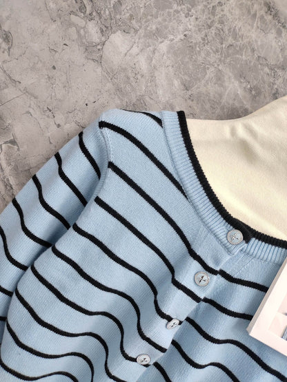 C 25 Cardigan with Swallow Buttons in Light Blue and Black