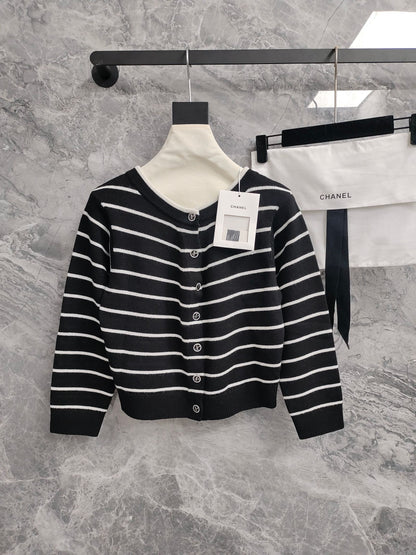 C 25 Cardigan with Swallow Buttons in Light Blue and Black