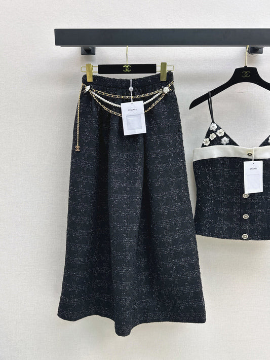 C 25 High-waisted pleated skirt with waist chain